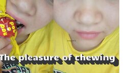 Enjoying the pleasure of chewing some chocolates