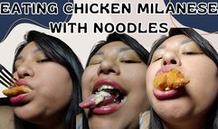 Eating chicken Milanese with noodles