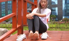 WL - The tall girl shows off her big feet wearing super see-through stockings