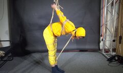 Marie tied and gagged in shiny nylon Rainwear