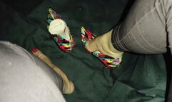 Alicia crosses her legs to let her stiletto heels dangle from her feet (2)