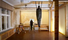 Dangling in Front of Me - Heavy and Elise Graves - Heavy writhes around in a snug leather body bag and thin latex hood suspended from a tall beam as a vibrator makes them orgasm!