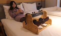 Cute Asian girl's beautiful feet are tickled