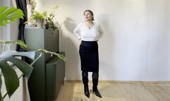 office girl standing in front of you in shiny pointed leather boots toe and heel tapping mg