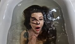 Long hair moving slowly in the water