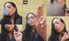 Outdoor smoke in a leather jacket