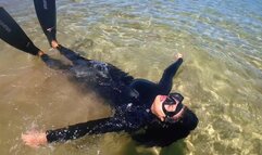 neoprene and snorkel gear in the sea