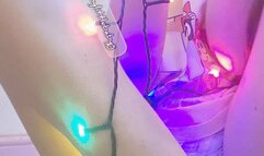 Tied up in christmas lights Tinylittlebabyg is a brainless giggly baby