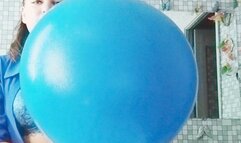 poping blue ballons
