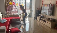 A girl in nylon socks tries to get out, but her socks slip on the floor