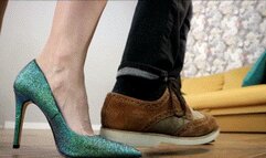 Agent John steps on left foot of super model