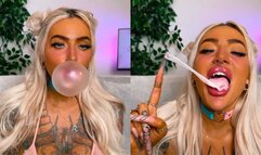 Big lips blowing popping bubblegum bubbles long nails