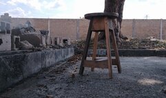 With my legs crossed and stiletto heels dangling from my feet (1)