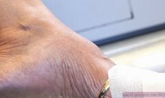 Slipper dangling feet fetish with sexy and elegant shoe