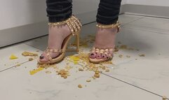 Marina crushes biscuits with her sexy high heel sandals