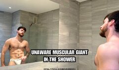 Unaware muscular giant in the shower