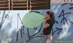 Milla Blows to Pop a Printed 27-Inch Chinese Balloon