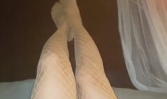 Really Nice Sexy legs with Tiny Feet and long delicious Toes wearing fishnet