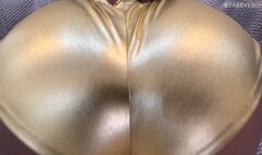 A FARTING STRIPPER IN GOLD BUM SHORTS