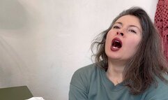 brunette girl widely yawing
