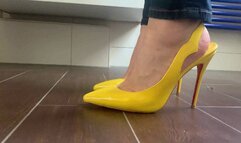 the goddess walking in yello heels
