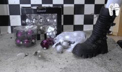 Christmas tree decorations under Christins strong Boots