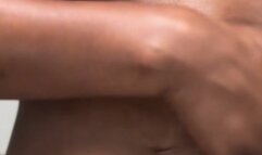 Nude Ebony belly button tease with oil