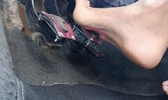 With bare feet pumping car pedals (77)