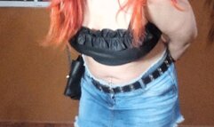 Smoking a cigarette before I go to the bar, crushing cig under my shiny boots