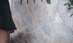 Tiny man at the feet of a giant woman (1)