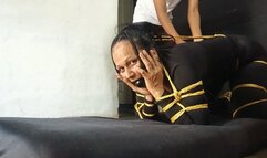 Four people tickle a woman tied all over the place (3)