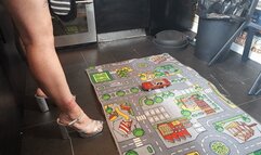 MissaRaeBerry toy car crush 1970 Dodge Challenger in silver heels High left view