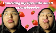 I smelling my lips with smell strawberries