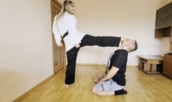 Karate girl showed that the slave's place is at her feet
