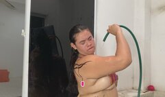 SUMMER GIRL HAS FUN WITH THE HOSE WATER