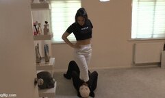 On the Floor, Between Her Feet