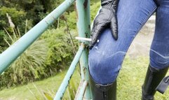 Kahina smokes in jeans and her Petrie boots