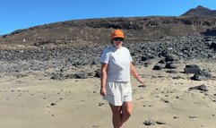 Pull short down and pee in sand