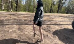 A girl in ballet flats walks on sticky and slippery mud, the mud flows inside and covers the ballet flats completely (short version)