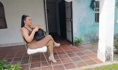 She pumps the pedals of the antique car as she tries to start it (2)