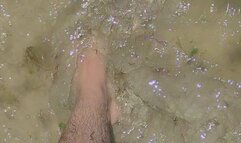Showing off my feet in the ocean