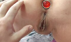 Butt plug in and pussy licking
