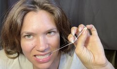 Nail Goddess gum chewing & popping with natural, long, sharp nails