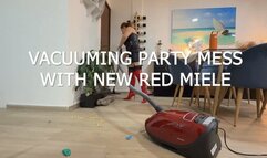 Vacuuming party mess with new red miele