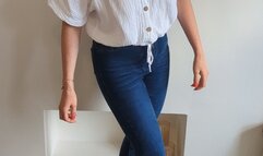 Priscilla toy car crush she crushes a tiny town with lots of small cars and buildings in big heels full body view