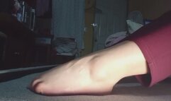 Rubbing feet on a mat