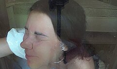 the maid presses herself against the glass a