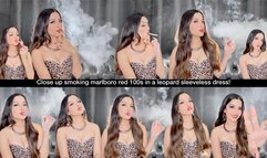 Close up smoking marlboro red 100s in a leopard sleeveless dress!