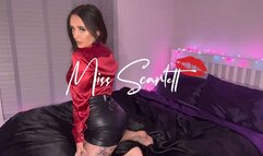 Scarlett's leather skirt and red satin blouse tease