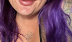 Girl blowing big blue balloon and sittopop